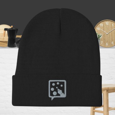 An Embroidered Beanie with an image of a cat on it.