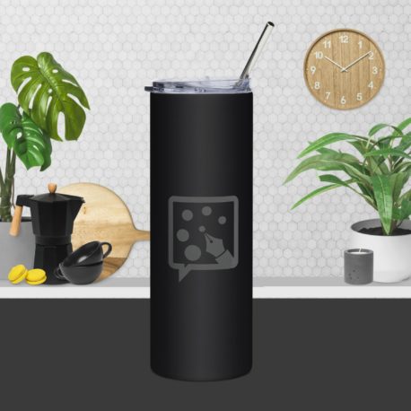 A black Stainless steel tumbler with a straw in front of a potted plant.