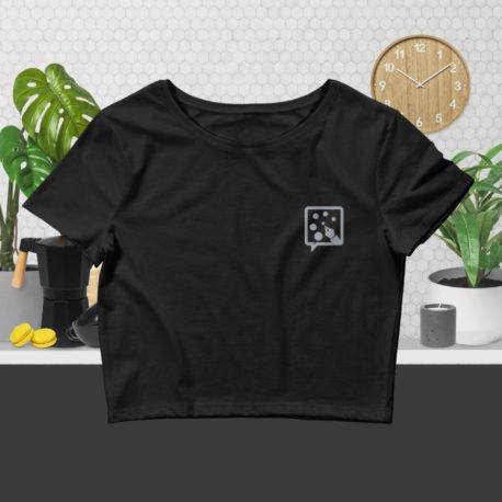 A black Women's Crop Tee with a logo on it.